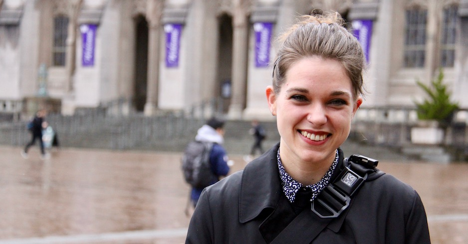 Claire stands on Red Square in front of Suzzallo Library