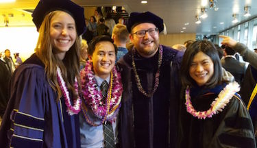 Brynn Olden stands with Dr. Pun