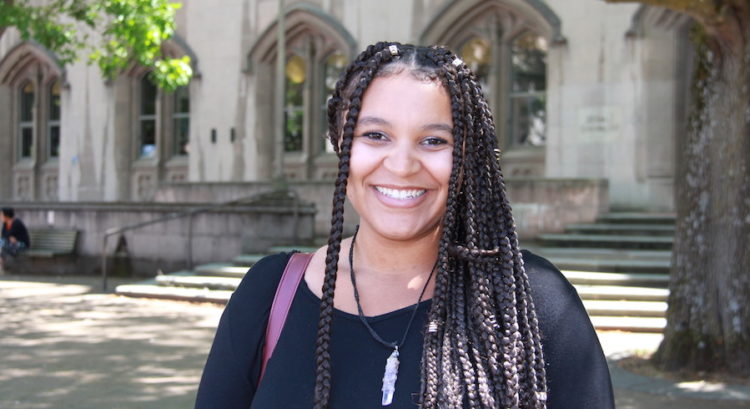 Meshell Sturgis in front of Gerberding Hall