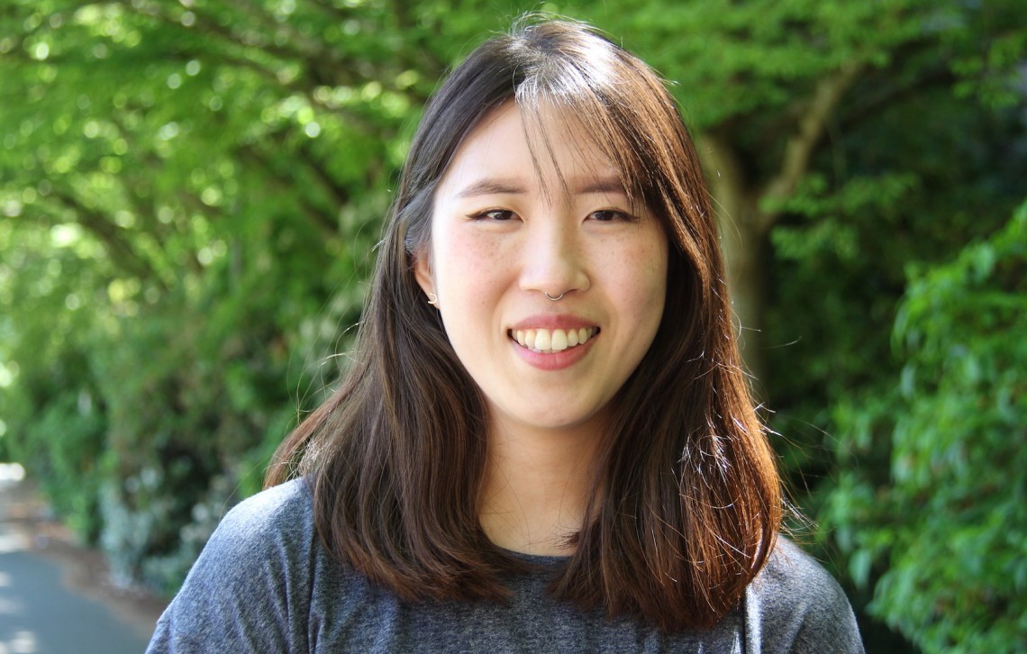 Woogee Bae stands outside on Seattle campus.