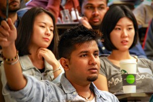 student raising hand